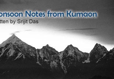 Snow-covered Himalayan peaks under a cloudy monsoon sky in Kumaon, India